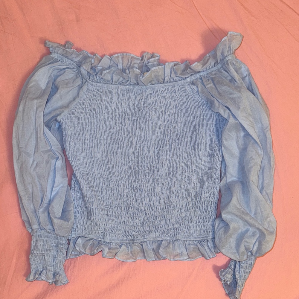 A Classy Chic Boutique Sky Blue Ruffle Blouse